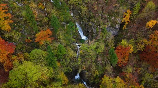 A soteska Pekel waterfall in the autumn, Slovenia, drone video, aerial footage