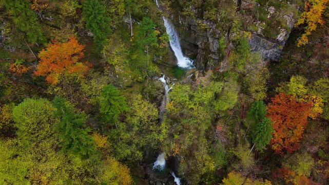 A soteska Pekel waterfall in the autumn, Slovenia, drone video, aerial footage