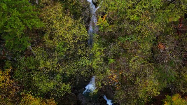 A soteska Pekel waterfall in the autumn, Slovenia, drone video, aerial footage