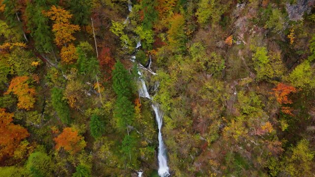 A soteska Pekel waterfall in the autumn, Slovenia, drone video, aerial footage