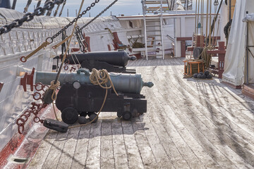 Museum, boat or cannon on deck in vessel for sightseeing, tourist attraction or national treasure...