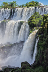 Waterfalls at Iguazu Falls on a sunny day, Misiones, Argentina