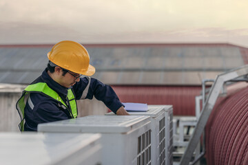 Engineers is checking the air conditioning cooling system of a major building or industrial...
