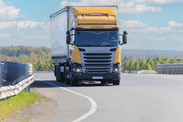 Large truck moving on country highway