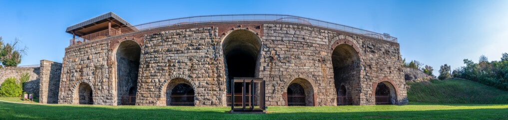 Fototapeta premium View of the ruined Scranton Iron Furnaces stone facade in Pennsylvania