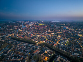 Fototapeta premium Aerial drone image of historic Frisian city of Sneek at night