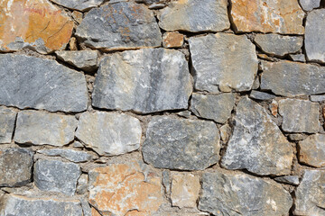 Alte Mauer oder Wand aus Naturstein in Griechenland