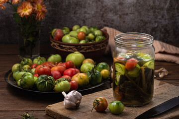 Making a delicious snack from unripe tomatoes.