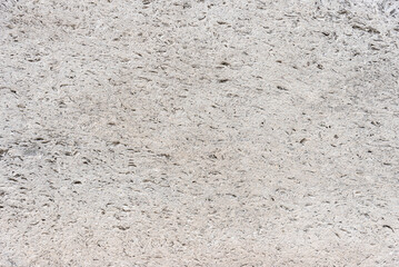 Stone texture of gray travertine, background.