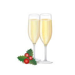 Two flute glasses filled with sparkling champagne, showing fine bubbles and golden colour with floral christmas decor holly leaves and berries.