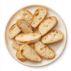 Naklejka premium A plate of fresh baguette slices, isolated on a white background, highlighting a classic bread