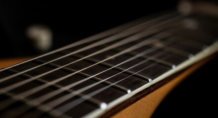 Obraz premium Close-up of electric guitar fretboard with selective focus