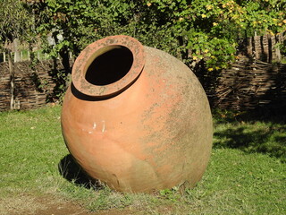 a huge jug for wine in the garden in georgia