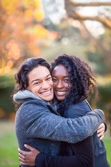 Fototapeta premium Pair of friends hugging warmly