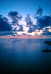 Beautiful sunrise in shades of blue off the beaches of San Carlos Sonora, Mexico. The immensity of the sea calmly embraces the islets of this Mexican tourist destination.