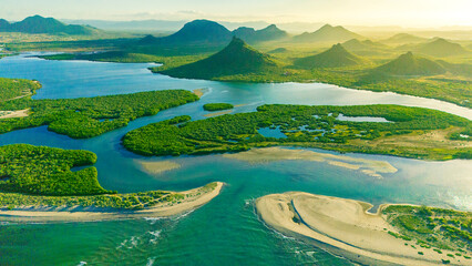 Sunset at the beautiful El Soldado estuary in San Carlos Sonora, Mexico. A unique paradisiacal scenery where sand, mangrove, salt and fresh water come together in a wonderful habitat for wildlife.