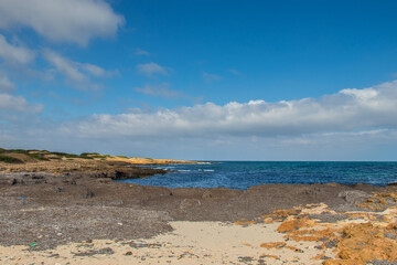 Deserted Wild Beach with Mountains and Sea in Tunisia, North Africa
