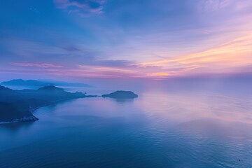 Obraz premium Stunning aerial view of sunrise over sea mist in Thailand.