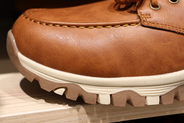 Introducing a Stylish Brown Leather Hiking Shoe featuring a Durable Sole for every adventure