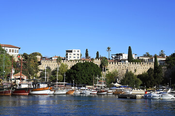 Naklejka premium Antalya Kaleici Marina, sunset in the Mediterranean, view of the Taurus Mountains, boats