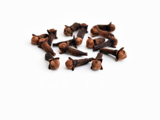 Dried cloves on a white background