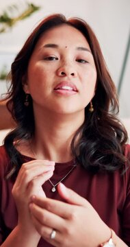 Hands, EFT tapping and face of Asian woman with therapy for virtual support in anxiety relief. Video call, portrait and therapist in online meeting for mental health, advice and holistic mindfulness