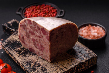 Homemade headcheese with salt, spices, herbs and vegetables