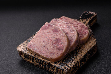 Homemade headcheese with salt, spices, herbs and vegetables