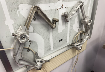 Close-up of metal surgical tools on a sterile surface in a hospital operating room. Instruments like scalpels, clamps, and forceps symbolize precision, care, and the life-saving role of surgery