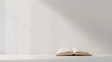 An open book on a table illuminated by soft natural light, creating a serene atmosphere.