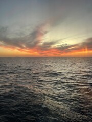 Colorful sunset on the water during a cruise ship
