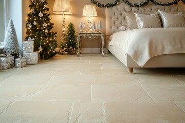 A soft beige stone floor with subtle cream tones, matched with an upholstered bed, crystal bedside lamps, and festive garlands on the headboard.