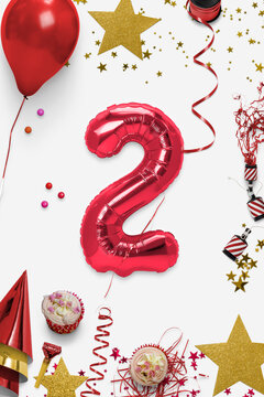 Numero 2 con stelle, coriandoli, coriandoli, champagne.
