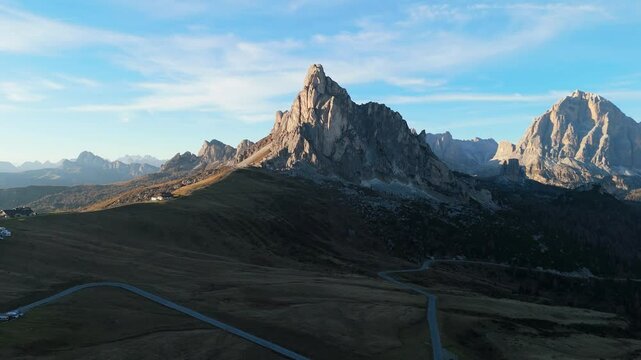 Passo Giau and Ra Gusela mountain in the evening in autumn, Dolomites, Italy, drone video, aerial footage