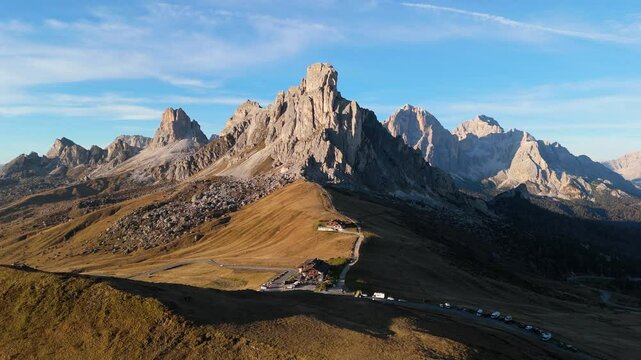Passo Giau and Ra Gusela mountain in the evening in autumn, Dolomites, Italy, drone video, aerial footage
