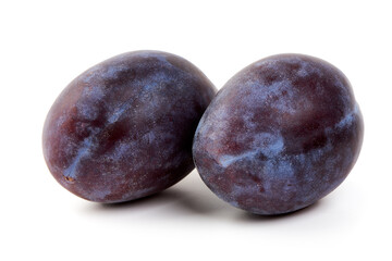 Red plums, isolated on white background.