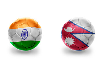 Obraz premium football balls with national flags of nepal and india,soccer teams. on the white background.