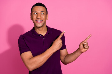 Photo portrait of attractive young man point look empty space dressed stylish violet clothes...