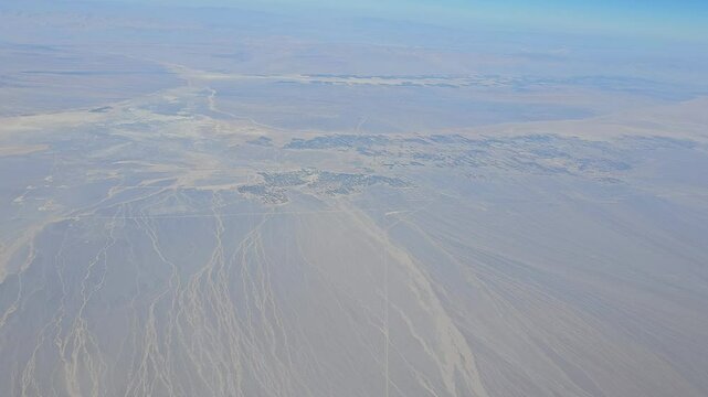 Aerial View of Hills and White Clouds Over Shahr-e Babak, Kerman Province, Iran