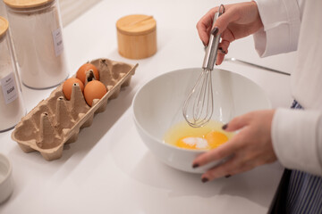 Woman at home in her kitchen cooking, woman hands, culinary blog, step-by-step recipe for cooking a...