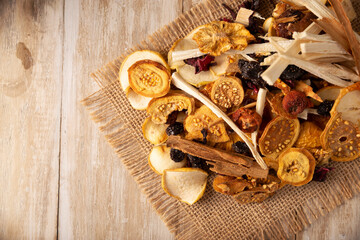 Dried fruits to prepare Mexican Christmas punch infusion, apple, sugar cane, tejocote, guava, hibiscus, cinnamon, prune, raisin, pineapple.