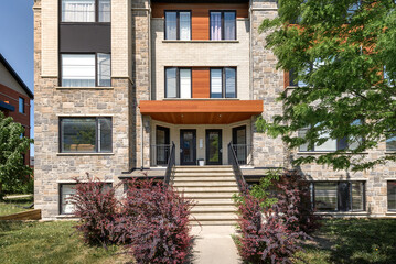 Inside and facade outside interior of modern renovated apartment flat in condominium in Brossard...