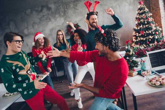 Portrait of company office workers have good mood dance celebration new year time loft office indoors - Powered by Adobe