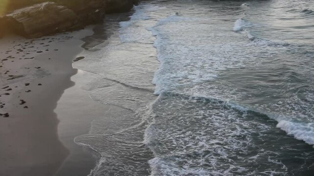 Os Castros beach in Ribadeo, Spain, at sunset