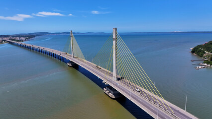 Anita Garibaldi Bridge At Laguna In Santa Catarina Brazil. Cable Bridge Landscape. Freeway Road. Seascape Background. Anita Garibaldi Bridge At Laguna In Santa Catarina Brazil. Winding Bridge.  © bydronevideos