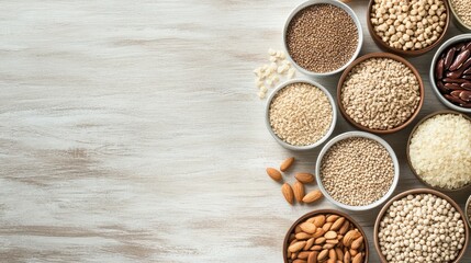 Assorted Grains and Nuts on Rustic Wooden Background