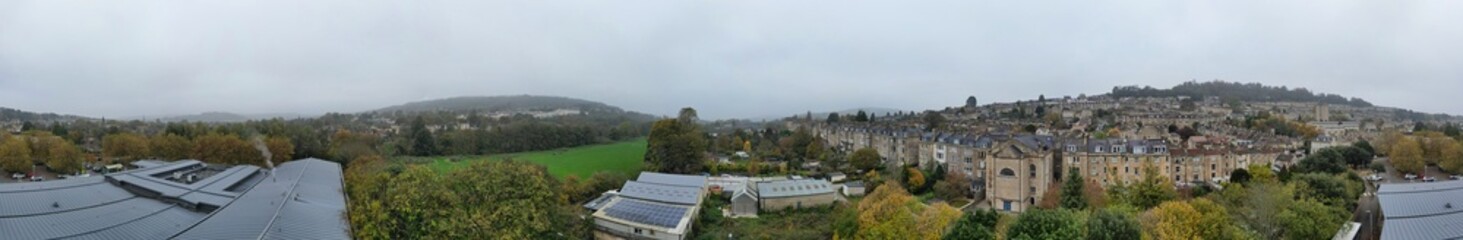 Fototapeta premium Aerial Panoramic View of Historical Walcot Bath City of England Which is Located in North East of Somerset, United Kingdom. High angle Footage Was Captured During Mostly Cloudy Early Morning