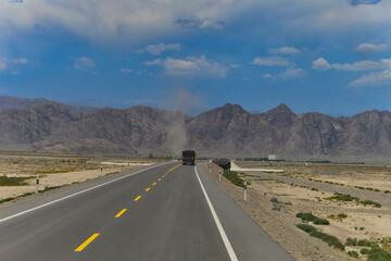 Desert road sand dunes in Xinjiang, China