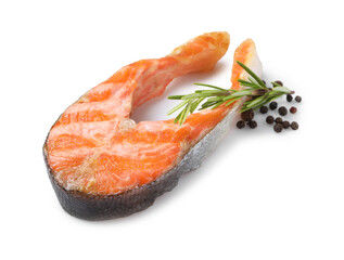 Tasty grilled salmon steak and spices isolated on white