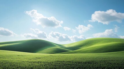 Obraz premium Rolling green hills under a bright blue sky with white clouds.